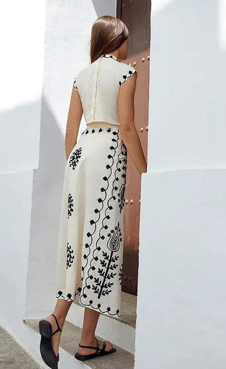 Charitini - Elegantes ärmelloses Oberteil Und Fließender Rock Im Satz